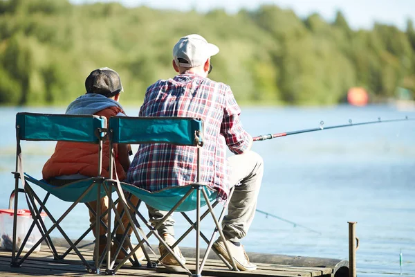Rear View Father Son Rods Sitting Water Sunny Day Fishing — Stock Photo, Image