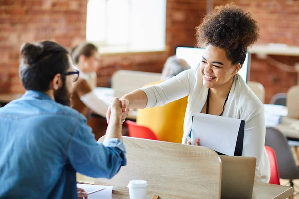 Two Young Intercultural Colleagues Shaking Hands Border Desks Office — Stock Photo, Image