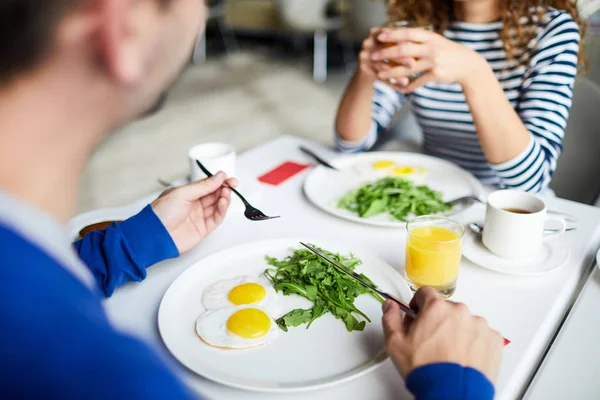 Close Unrecognizable Man Holding Silverware Eating Fried Eggs Greens Breakfast — Stock Photo, Image