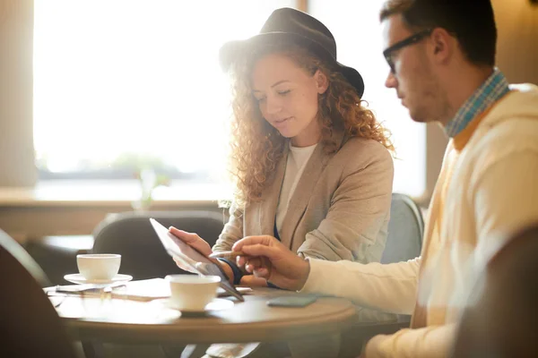 One Young Casual Colleagues Pointing Data Tablet Making Presentation New — Stock Photo, Image