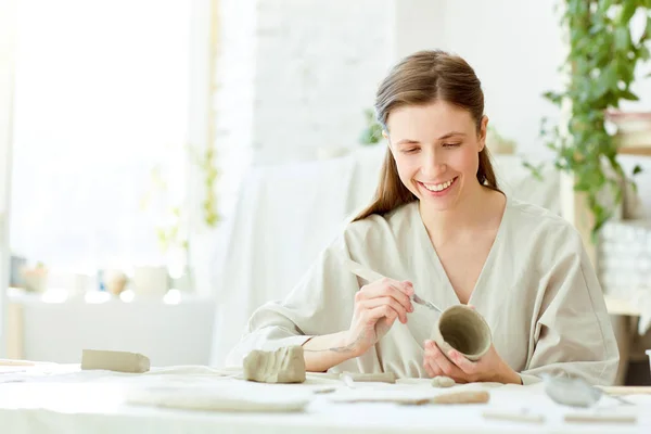 Happy Young Woman Producing Clay Mug While Working Studio — Stock Photo, Image