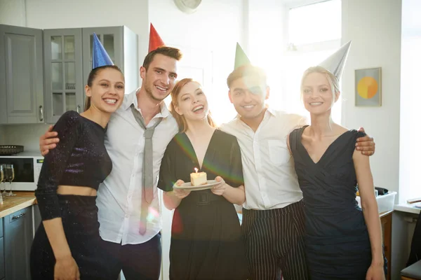 Laughing Girl Piece Birthday Cake Standing Her Affectionate Friends While — Stock Photo, Image