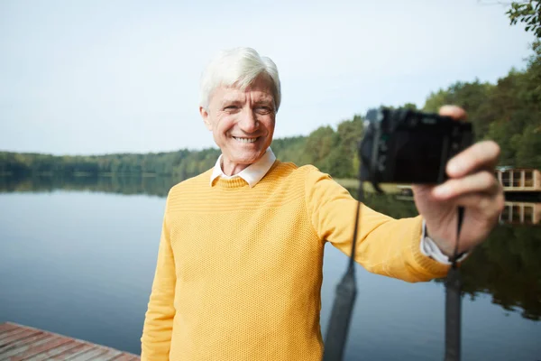 Cheerful Gray Haired Senior Man Yellow Sweater Being Vacation Standing — Stock Photo, Image