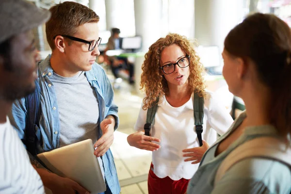 Group Young Intercultural Girls Guys Backpacks Discussing Timetable Lessons College — Stock Photo, Image