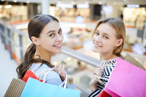 Two Happy Girls Bags Looking You While Going Visit More — Stock Photo, Image