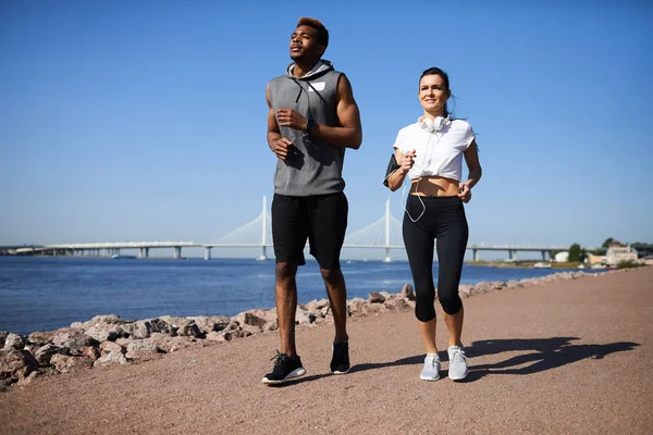 Content Motivated Young Multi Ethnic Couple Sportswear Jogging City Beach — Stock Photo, Image