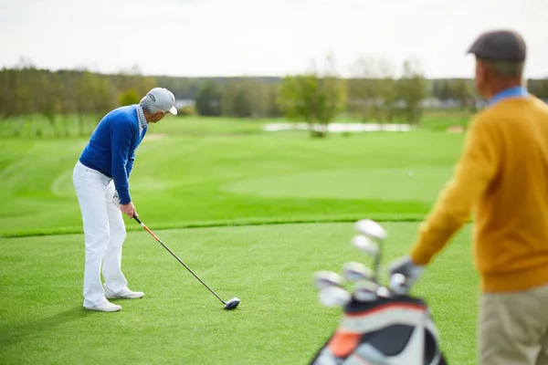 Aged Golf Player Going Hit Ball Club While Looking Aside — Stock Photo, Image