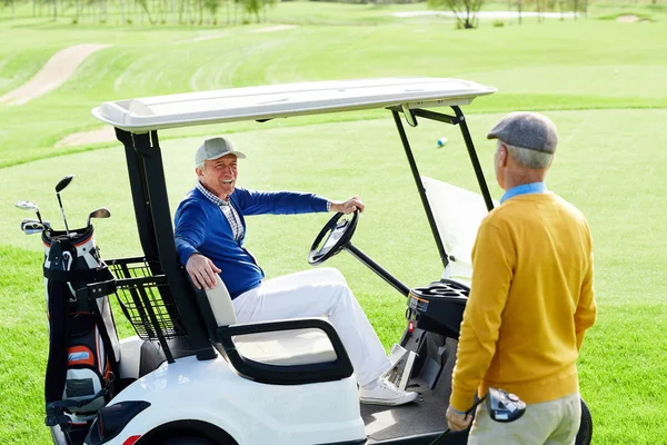 Aged Man Sitting Golf Car Talking His Buddy Standing Green — Stock Photo, Image