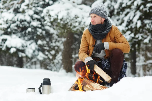Pensive Handsome Young Male Hiker Warm Scarf Sitting Campfire While — Stock Photo, Image