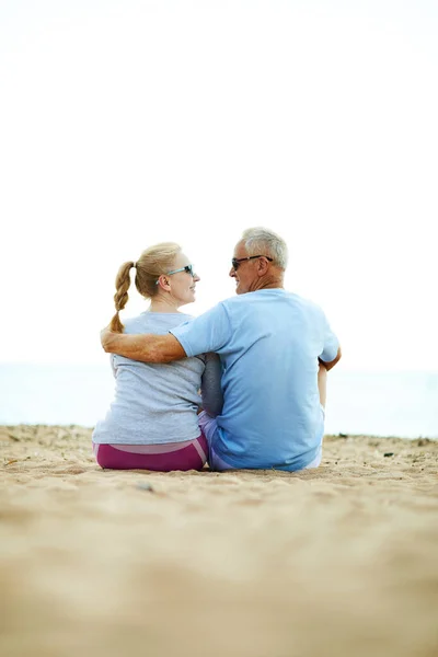 Rear View Seniors Looking One Another While Sitting Sand Having — Stock Photo, Image