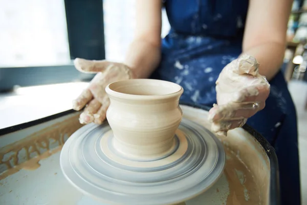 Female Potter Sitting Pottery Wheel Her Hands Rotating Half Made — Stock Photo, Image