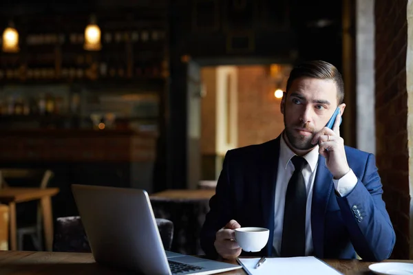 Serious Confident Handsome Young Bearded Businessman Looking Away Talking Mobile — Stock Photo, Image