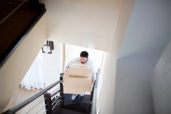 Young Man Big Smaller Boxes Going Upstairs New House Relocation — Stock Photo, Image