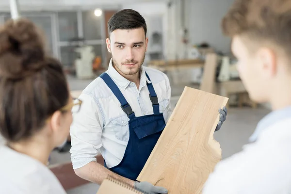 Young Man Wooden Board Consulting Two Experts Discussion Working Materials — Stock Photo, Image