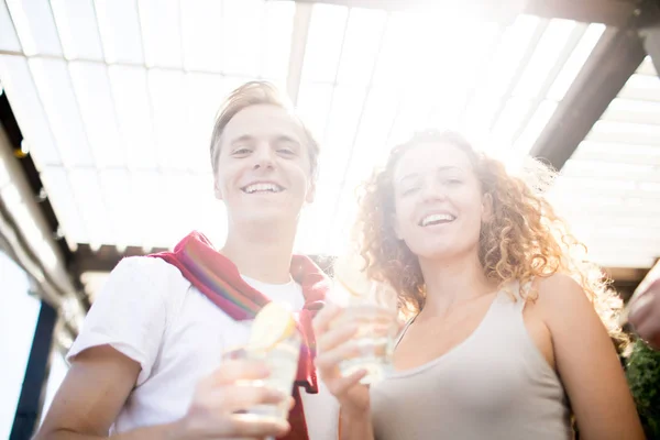 Young Laughing Couple Drinks Looking You Summer Day While Spending — 스톡 사진