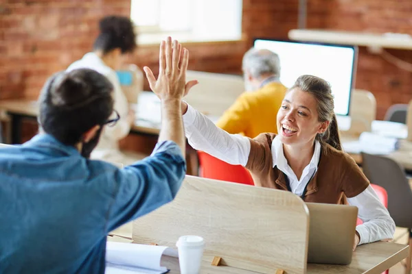 Cheerful Successful Businesswoman Giving High Five Her Colleague Sitting Front — Stock Photo, Image