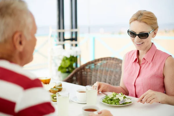 Happy Mature Female Sunglasses Pink Blouse Sitting Served Table Going — Stockfoto