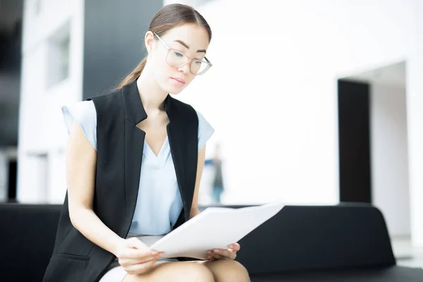 Young Serious Businesswoman Concentrating Paperwork Reading Document — 스톡 사진