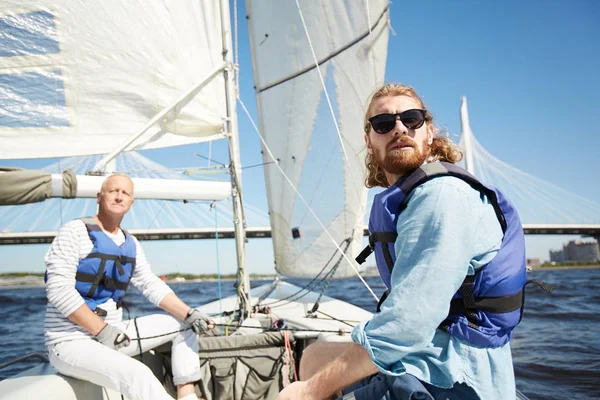 Serious Handsome Men Life Jacket Frowning Sun Looking While Traveling — Stock Photo, Image