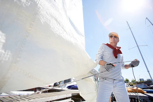 Serious Mature Sailor Sunglasses Cap Wearing Sweater Wrapped Neck Pulling — Stock Photo, Image