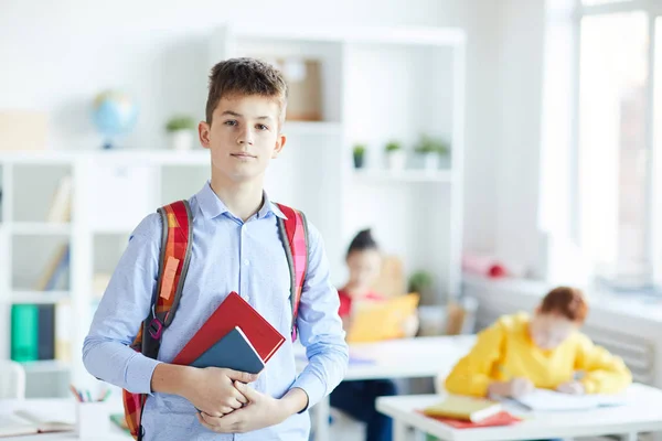 Diligent Schoolboy Books Backpack Looking You While Standing Background Two — Stock Photo, Image