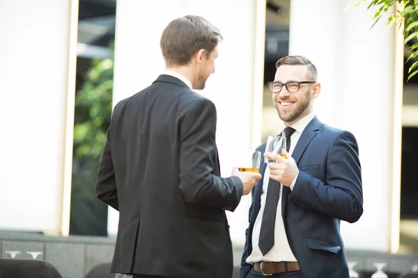 Two Happy Businessmen Glasses Juice Discussing Latest Business News Restaurant — Stock Photo, Image