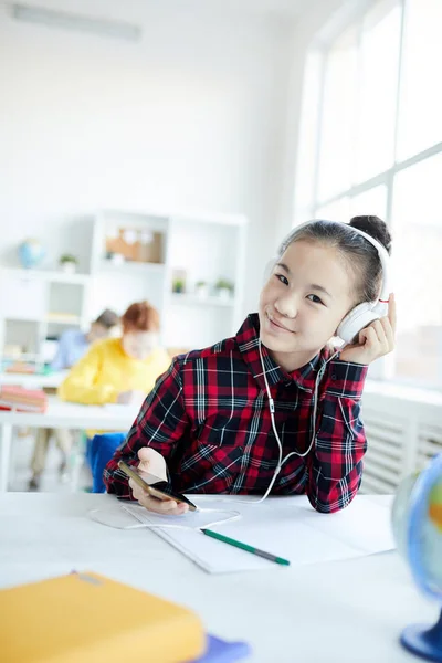 Cute Little Schoolgirl Listening Her Favorite Music Headphones Playlist Smartphone — Stock Photo, Image