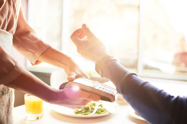 Contemporary Client Using His Smartwatch Pay Order Restaurant While Keeping — Stock Photo, Image