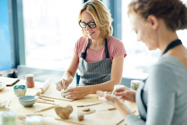 Two Creative Clay Masters Sitting Workplace Kneading Workpieces Making Earthenware — Stock Photo, Image