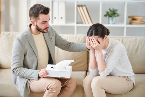 Supportive Male Psychologist Keeping His Hand Shoulder Desperate Patient While — Stock Photo, Image