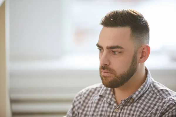 Serious Young Casual Employee Beard Sitting Office Looking Attentively Computer — Stock Photo, Image