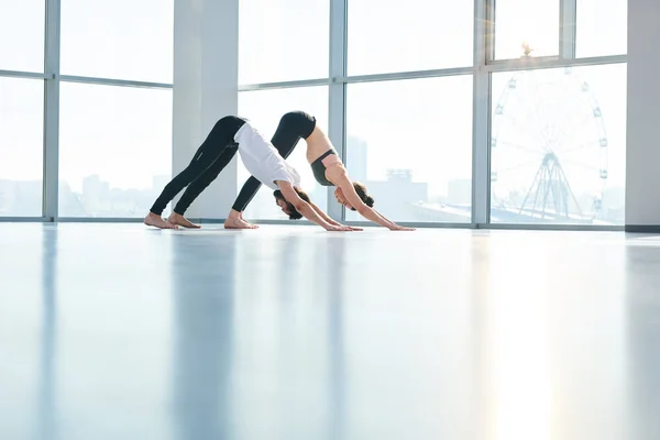 Young Active Man Woman Sportswear Standing Floor One Yoga Positions — Stock Photo, Image