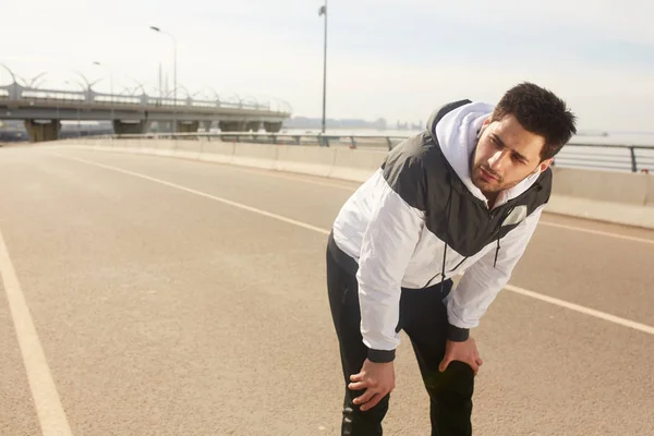 Young Tired Sportsman Activewear Bending Forward While Standing Racetrack Stadium — Stock Photo, Image