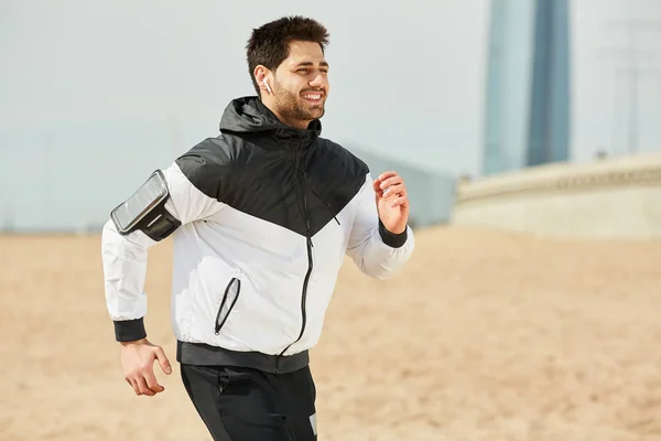 Young Cheerful Athlete Sportswear Running Beach Sunny Morning While Listening — Stock Photo, Image