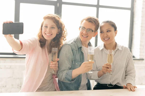 Three Young Cheerful Friends Flutes Champagne Making Selfie While Having — Stock Photo, Image