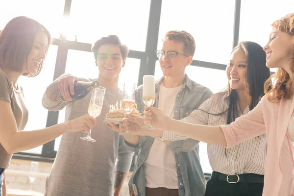 One Guys Pouring Champagne Flutes His Friends While Going Make — Stock Photo, Image