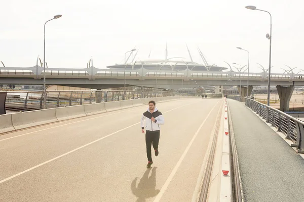 Young Male Runner Jogging Racetrack Border Morning Workout Urban Environment — Stock Photo, Image