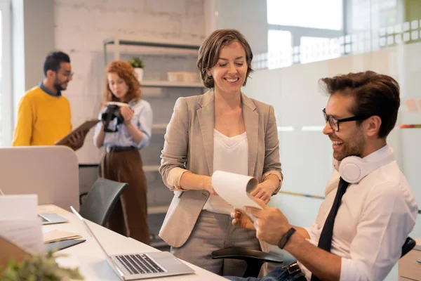 Cheerful Confident Team Brokers Viewing Papers While Analyzing Sales Together — Stock Photo, Image