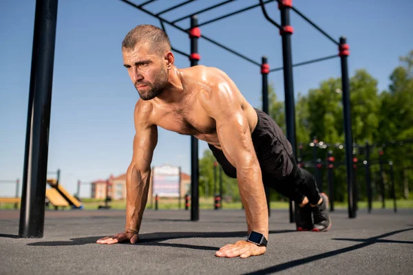 Young Shirtless Athlete Sweating While Standing Stretched Arms Sportsground While — Stock Photo, Image