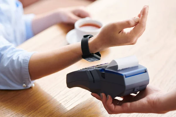 Close Unrecognizable Businesswoman Using Smartwatch Wireless Payment Modern Cafe Waiter — Stock Photo, Image