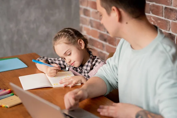 Content Cute Little Daughter Braid Sitting Table Showing Drawing Notebook — Stock Photo, Image