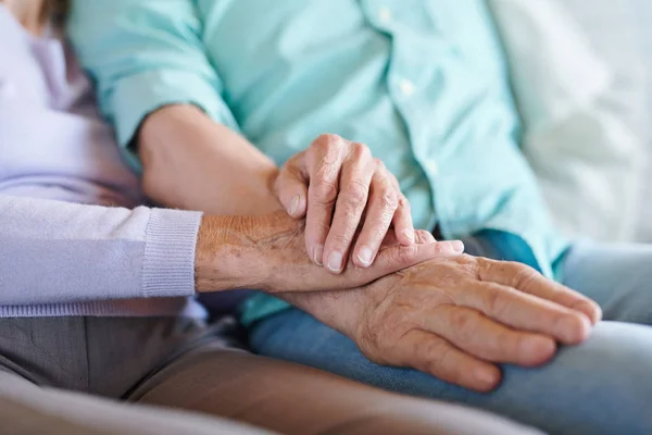 Senior Spouses Casualwear Holding Hands While Sitting Next One Another — Stock Photo, Image