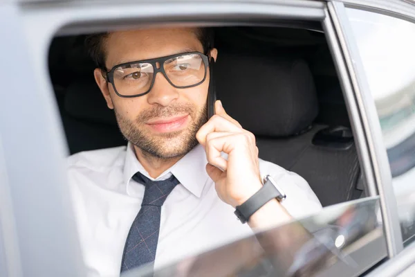 Confident Young Agent Eyeglasses White Shirt Looking Car Window While — Stock Photo, Image