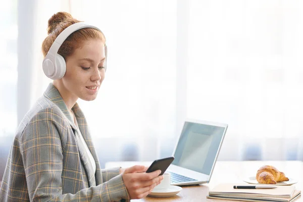 Positive Redhead Young Female Entrepreneur Stylish Jacket Listening Music Headphones — Stock Photo, Image