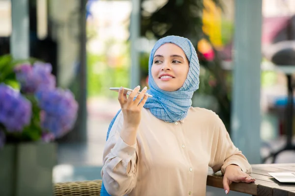 Happy Young Woman Recording Voice Message Smartphone While Sitting Urban — Stock Photo, Image