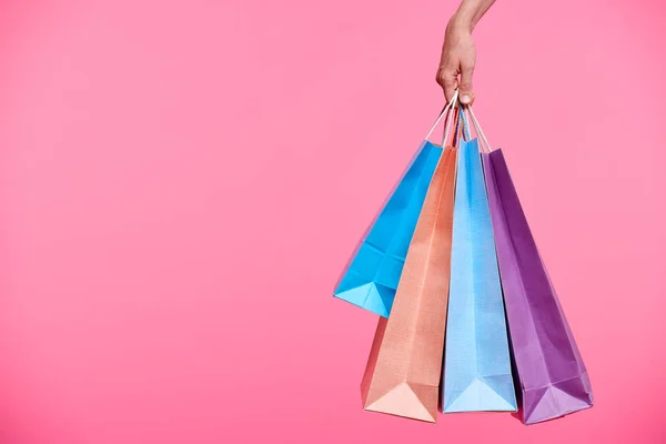 Vier Kleurrijke Paperbags Gehouden Met Hand Van Vrouwelijke Shopaholic Terwijl — Stockfoto