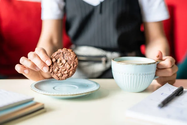 Businesswoman Holding Chocolate Cookie Nuts Plate While Sitting Desk Having — Stock Photo, Image