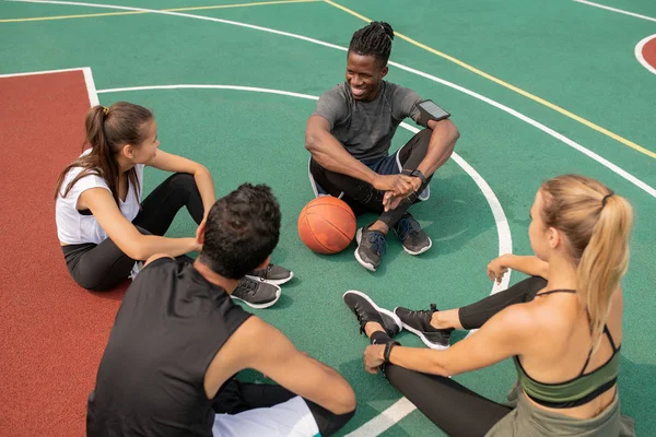 Group Young Friendly Intercultural People Sitting Playground While Getting Ready — Stock Photo, Image