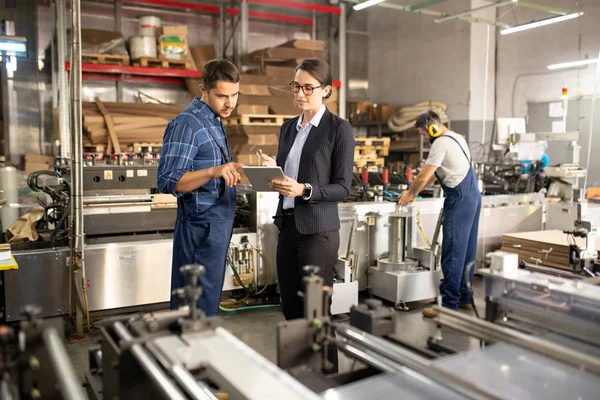 Two Young Confident Workers Processing Factory Discussing Online Data Tablet — Stock Photo, Image