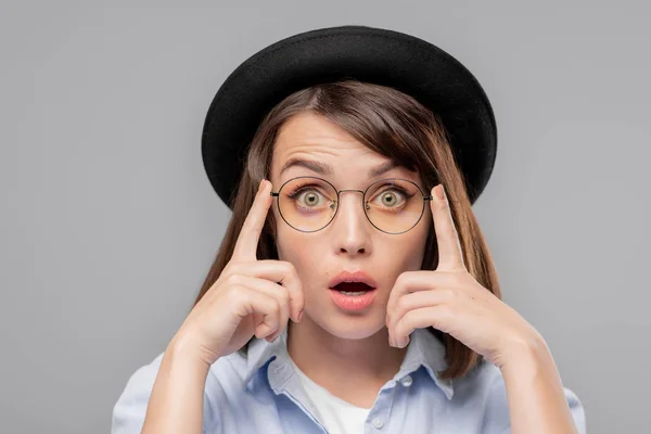 Young Astonished Female Hat Eyeglasses Looking You Facial Expression Showing — Stock Photo, Image